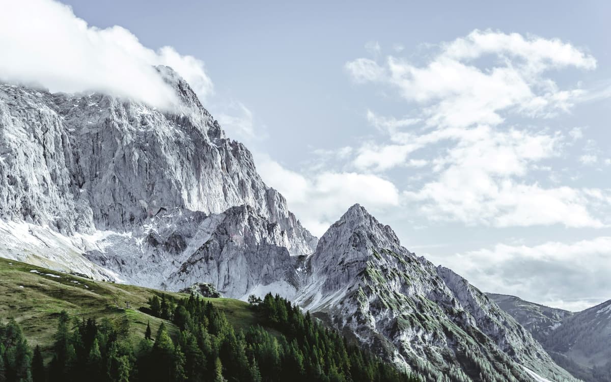 Quiet Austrian mountain valley representing hidden gem ski resorts