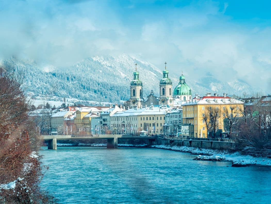 Innsbruck old town and surrounding snowy mountains during a ski and city break